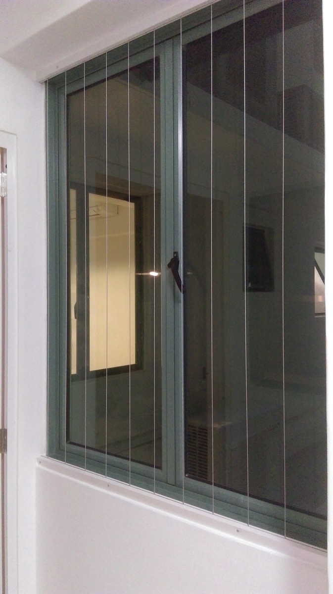 This is a Picture of Invisible grille at Singapore condo, vertical line, Choa Chu Kang